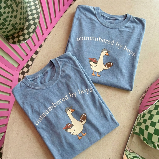 Printed outnumbered by boys