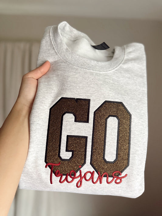 Embroidered glitter mascot