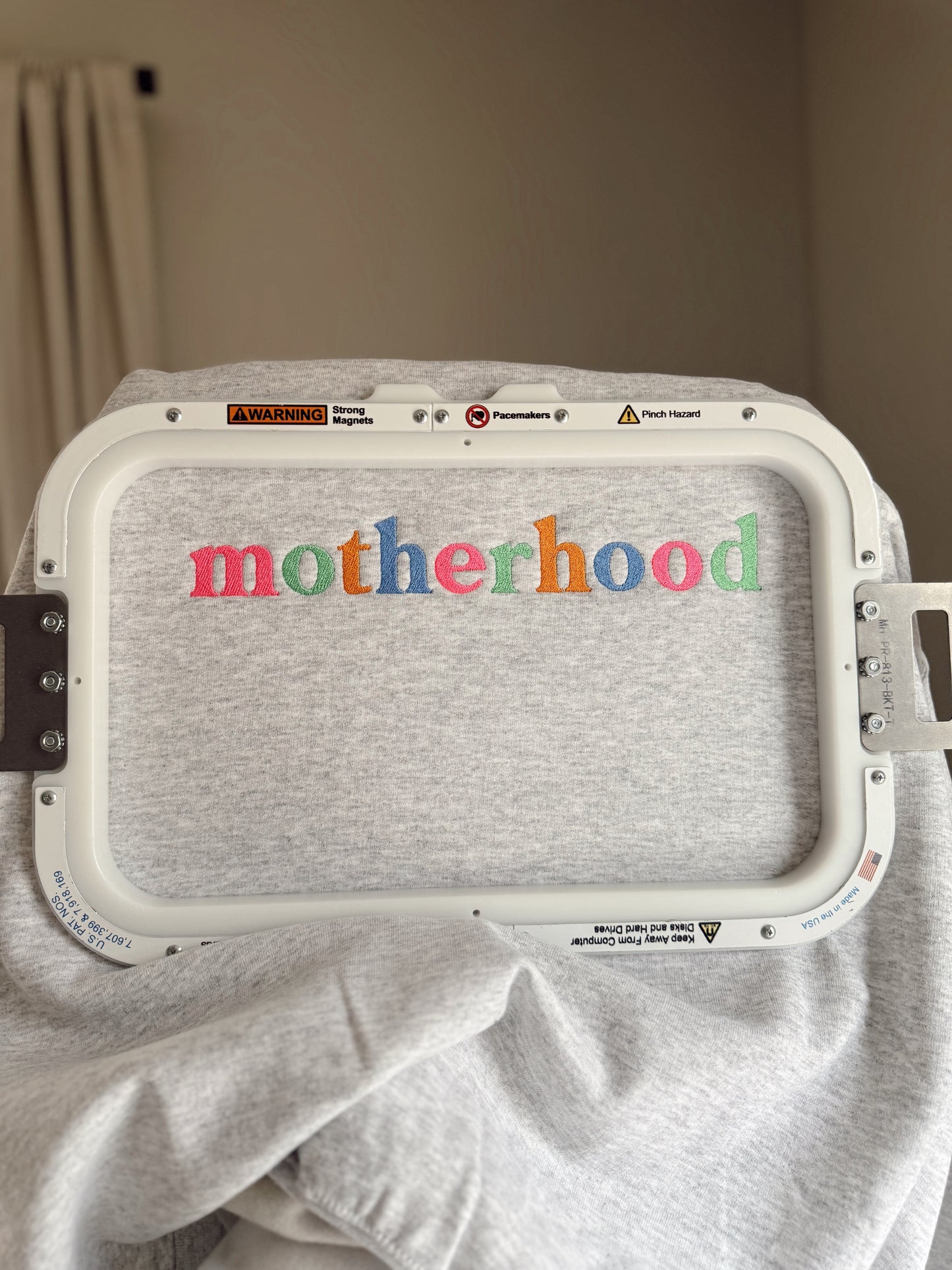 Embroidered motherhood