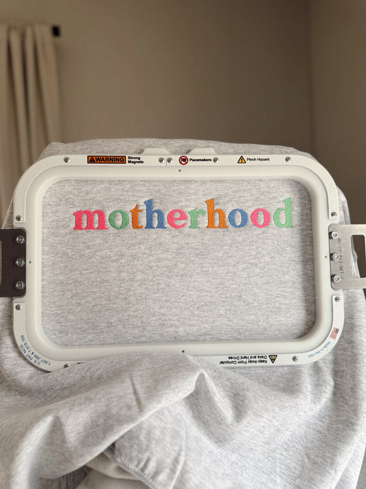 Embroidered motherhood